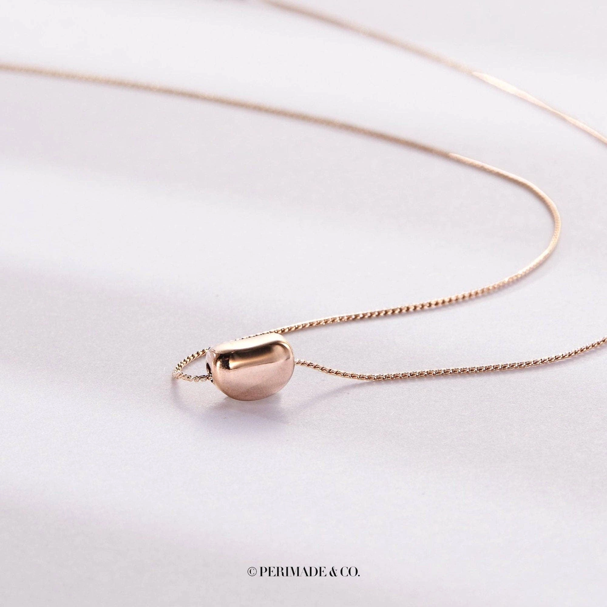 Cute Gold Acacia Bean Necklace in 925 Sterling Silver. Steel
